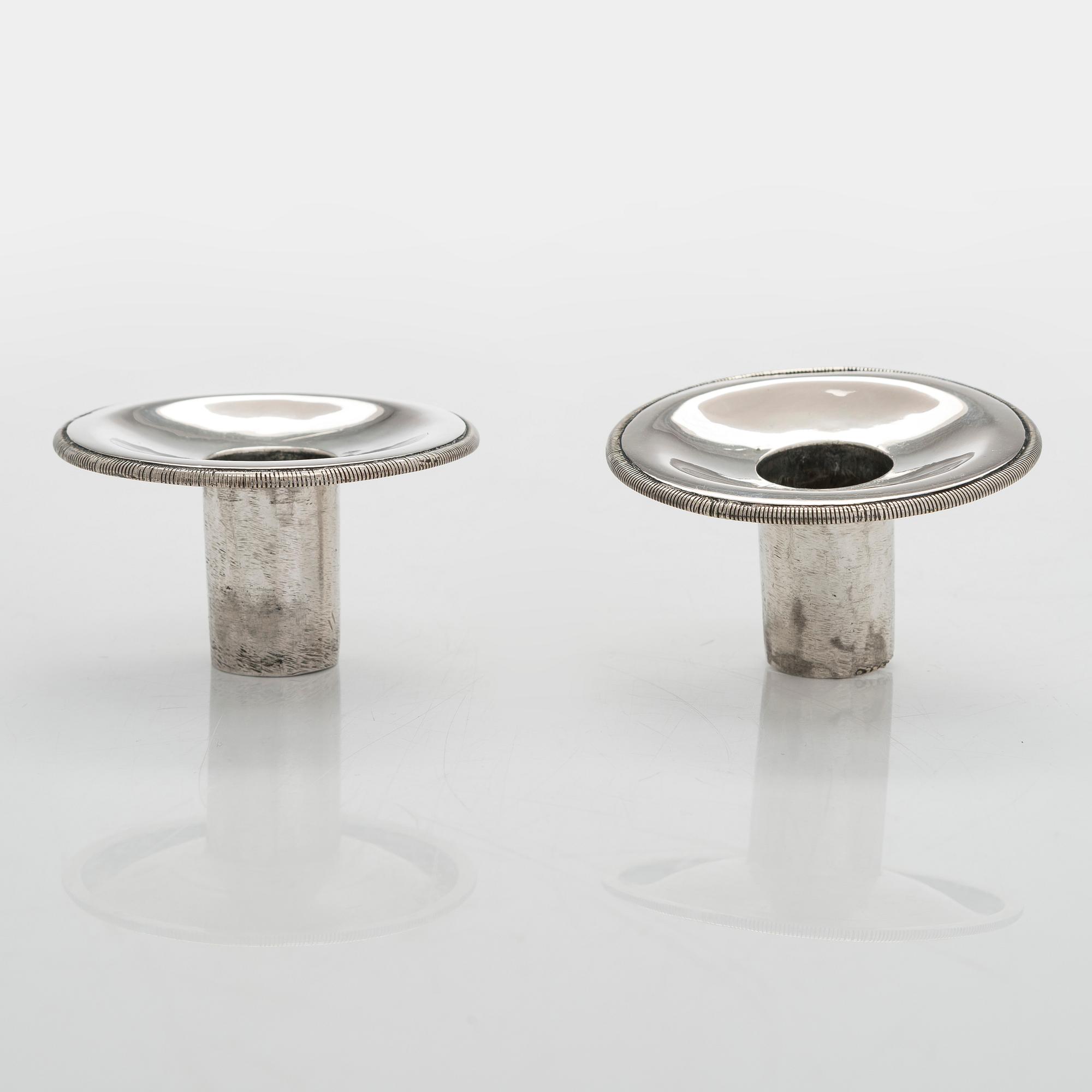 A pair of Empire silver candlesticks, Northern Europe, first half of the 19th century.
