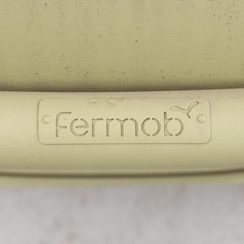 Frédéric Sofia, a table and two chairs for outdoor use, "Luxembourg" Fermob, France, 21st century.