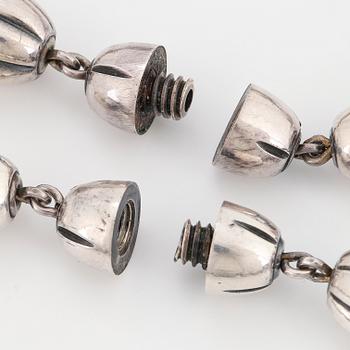 COLLIER, ARMBAND/TILLÄGGSLÄNK, 2 st, "Halikon Kääty", silver. Kalevala Koru 1972-83.