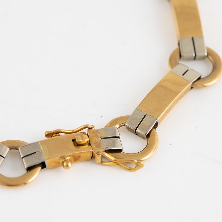 Armlänk, 18 k guld, svensk importstämpel.