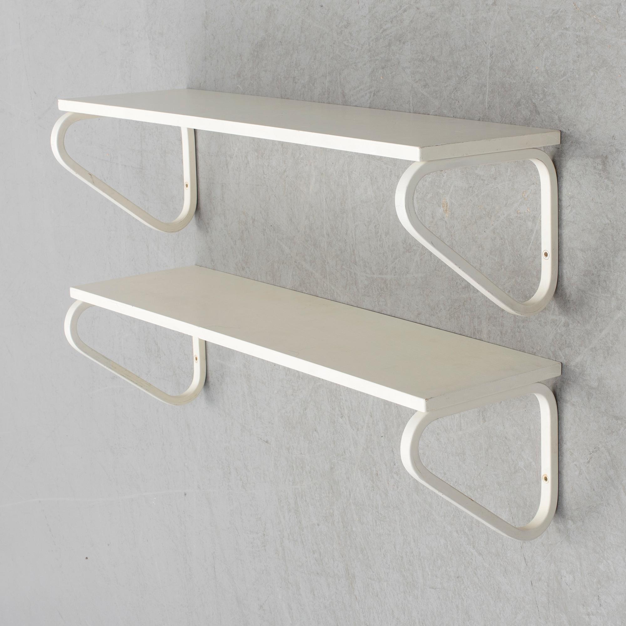 ALVAR AALTO, a pair of model 112 painted wall shelves from Artek, Finland.