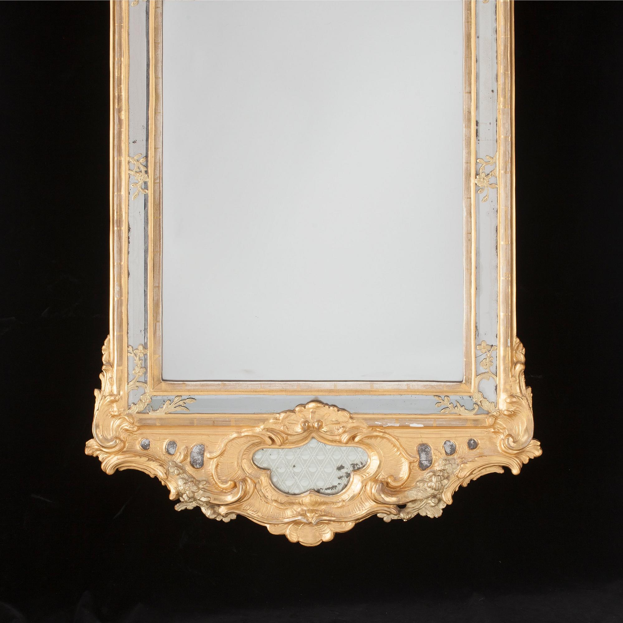 A Swedish Rococo mirror dated 1771.