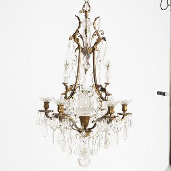A six-branch rococ-style chandelier, first part 20th century.