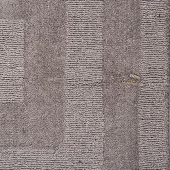 A Layered "Wool Cubes" carpet, 390x620 cm.
