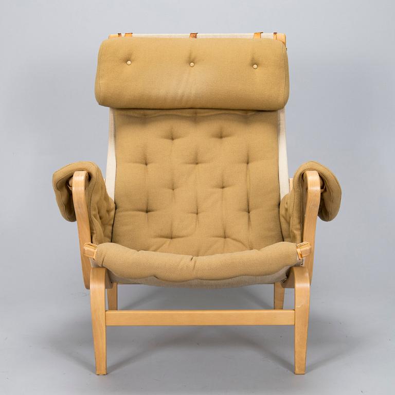 Bruno Mathsson, A "Pernilla" armchair with footstool, for DUX, designed in 1944.