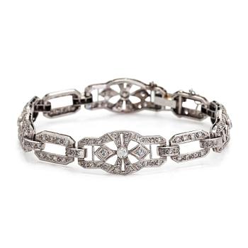 A platinum bracelet in Art deco style, with brilliant and eight-cut diamonds totalling approximately 2 ct.