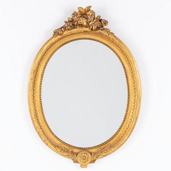 A Gustavian-style gilt-gesso mirror, early 20th century.