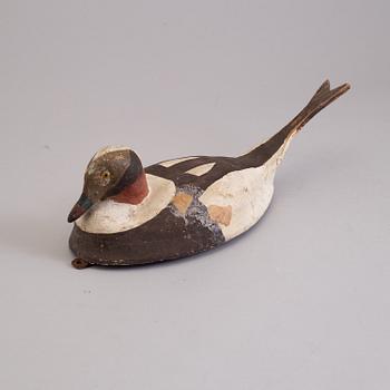 4 painted wooden ducks from the 20th century.