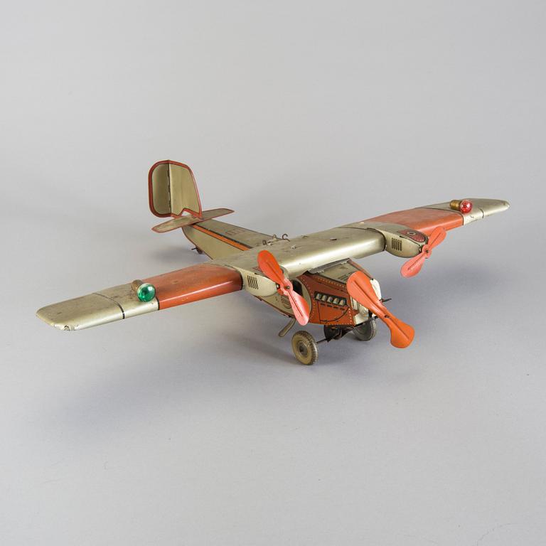 A Tipp & Co tinplate airplane, Germany, 1930s.