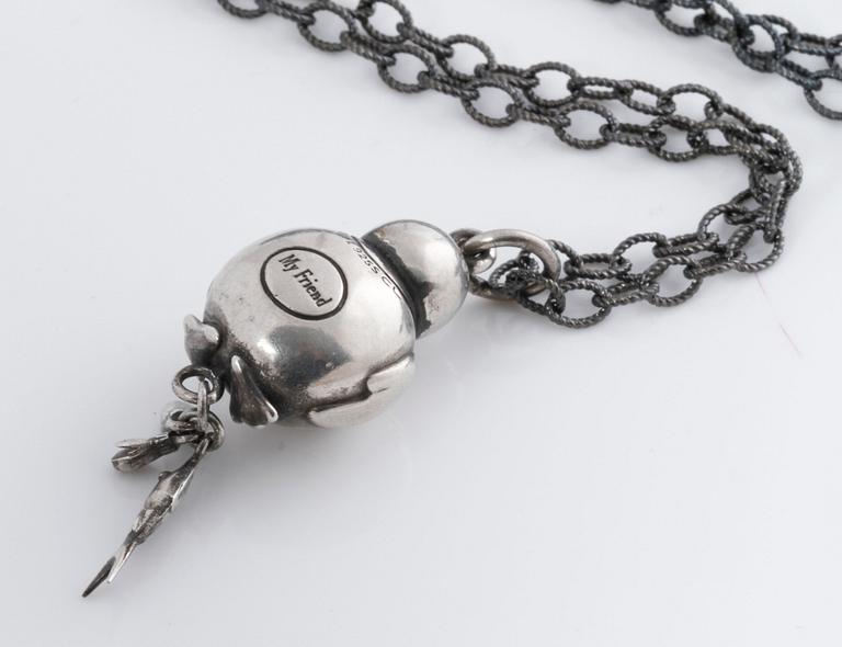A pendant, "My friend" by Ole Lynggaard.