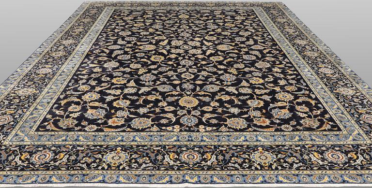 A Keshan carpet, c. 440 x 308 cm.