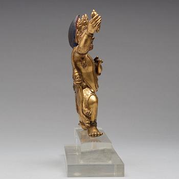 A Sinotibetan gilt bronze figure of Vajrapani, possibly 17/18th Century.