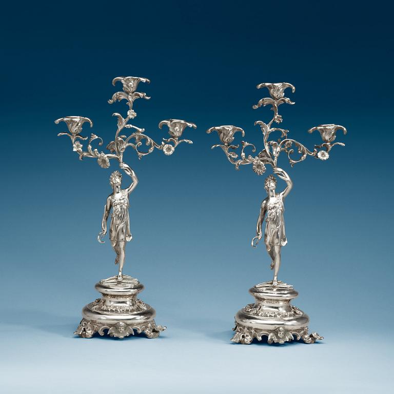 A pair of Swedish 19th century silver candelabra, makers mark of Gustaf Möllenborg, Stockholm 1864.
