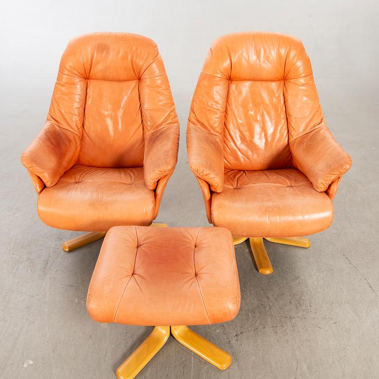Skalma Denmark, two armchairs with footstool, leather, 20th century later part.