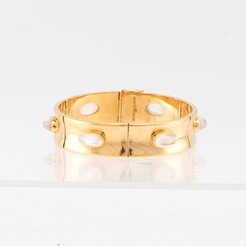 Armband 18K guld samt cabochonslipade månstenar Olle Torrestad Halmstad 1962.