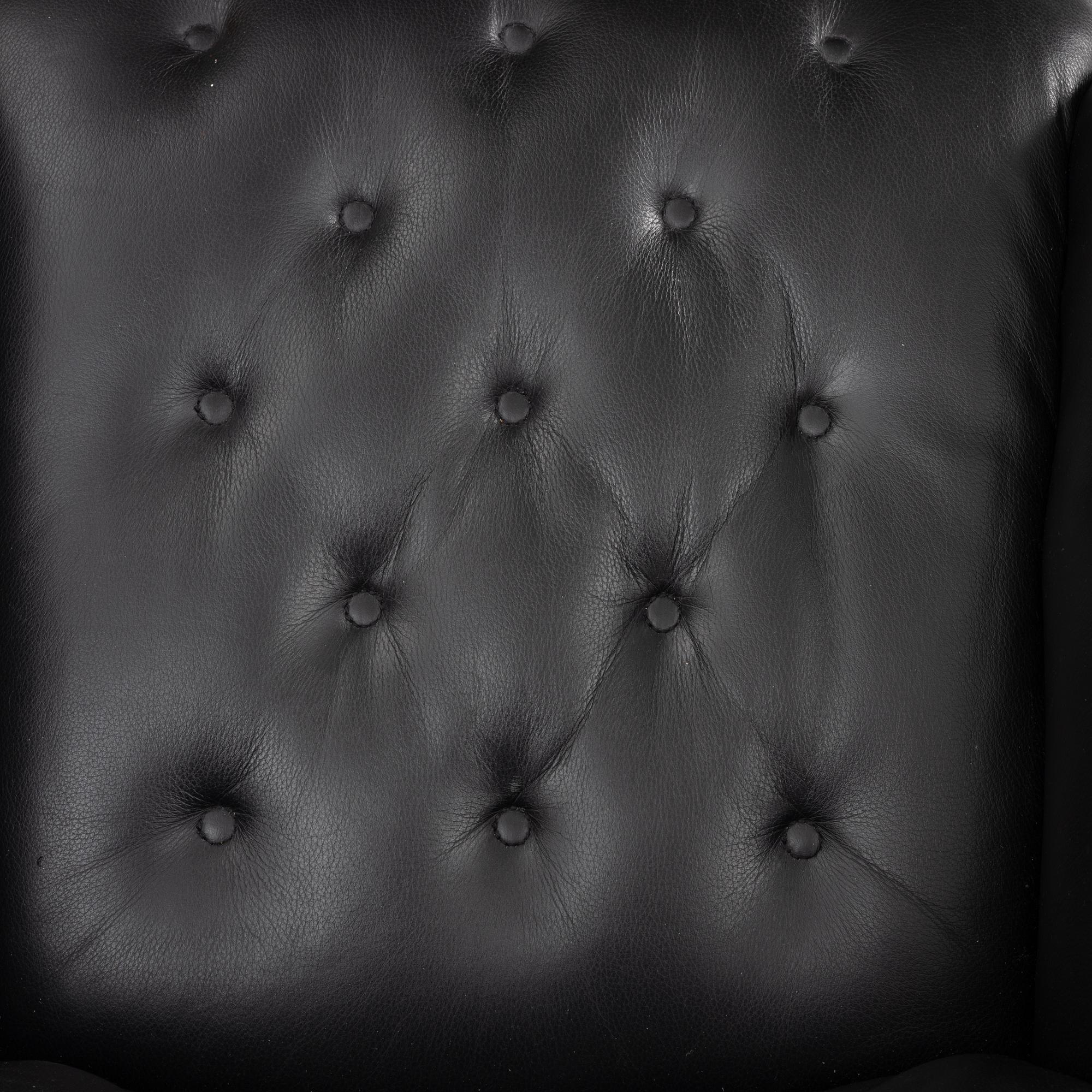 Hjort Knudsen, fåtölj och fotpall, Danmark.