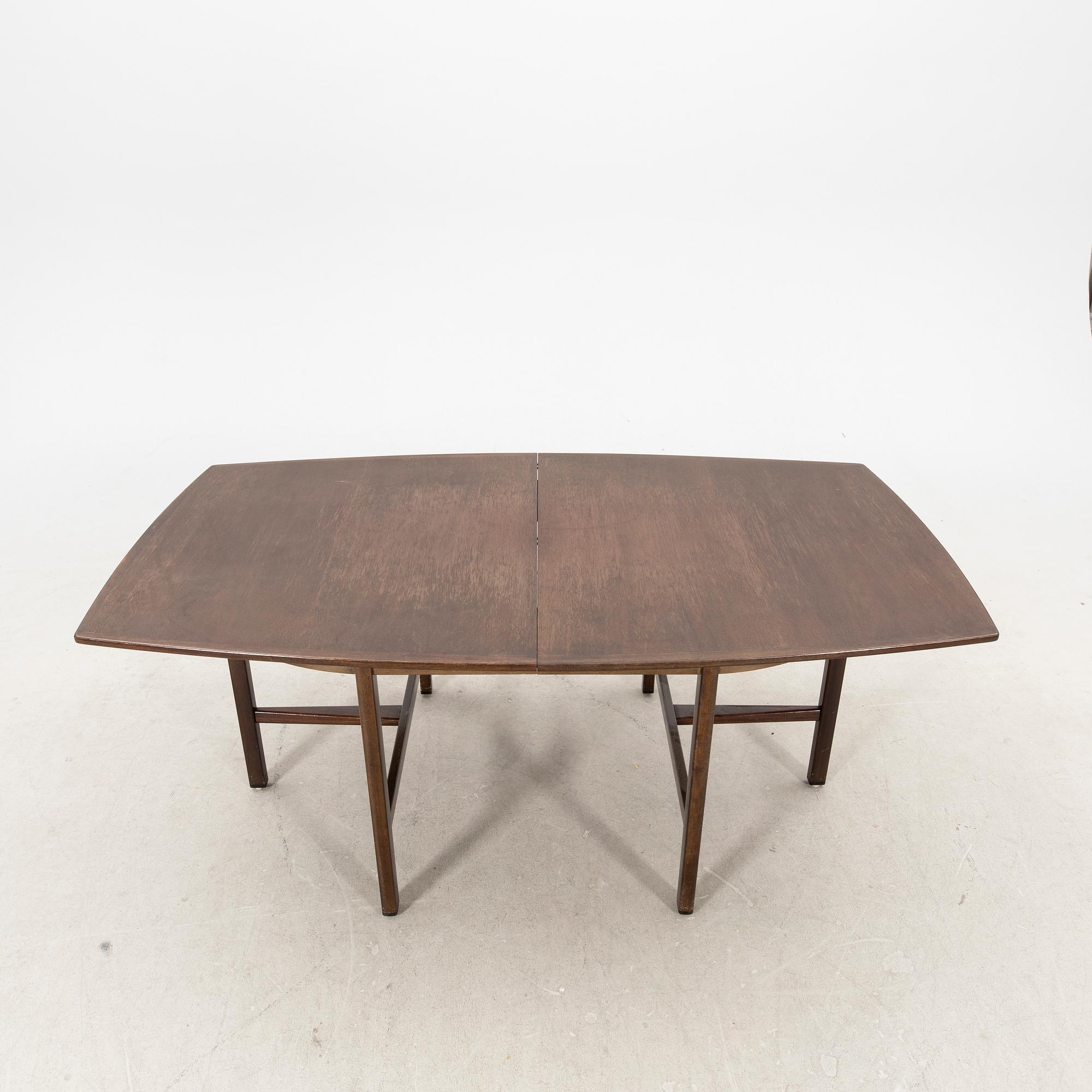 A table and four chairs in lacquered mahogany by David Rosén, "Triva-diné", middle of the 20th century.