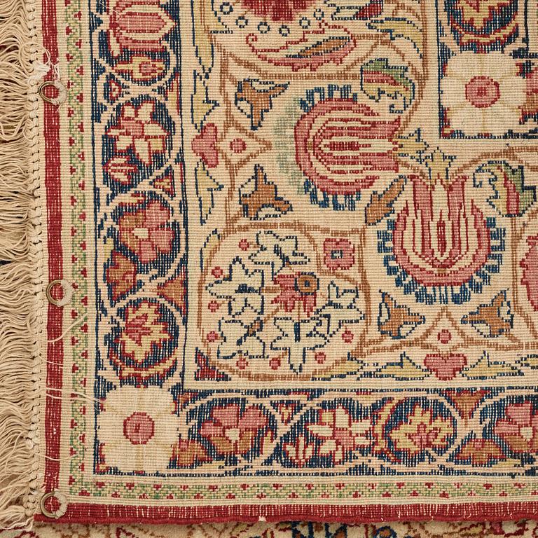 A RUG, an antique/semi-antique Kerman Laver  figural, ca 232,5 x 139,5 cm.