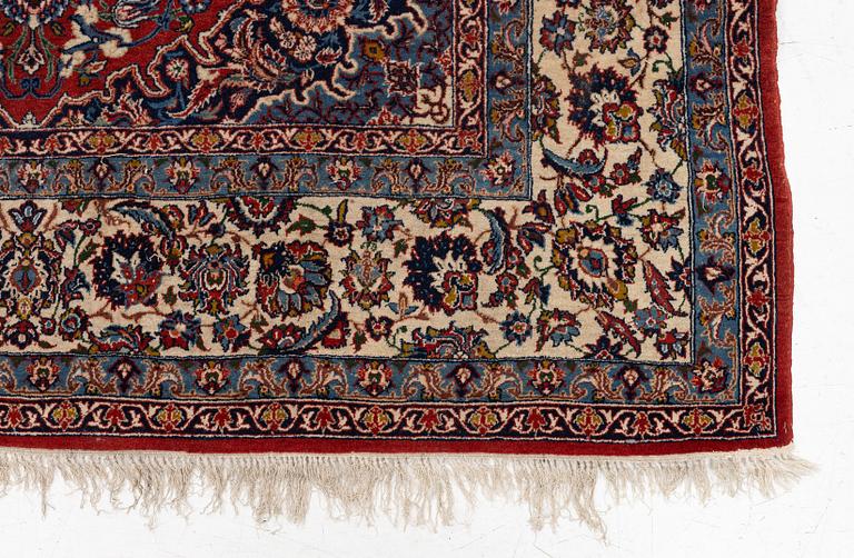 An Isfahan rug, c. 225 x 150 cm.