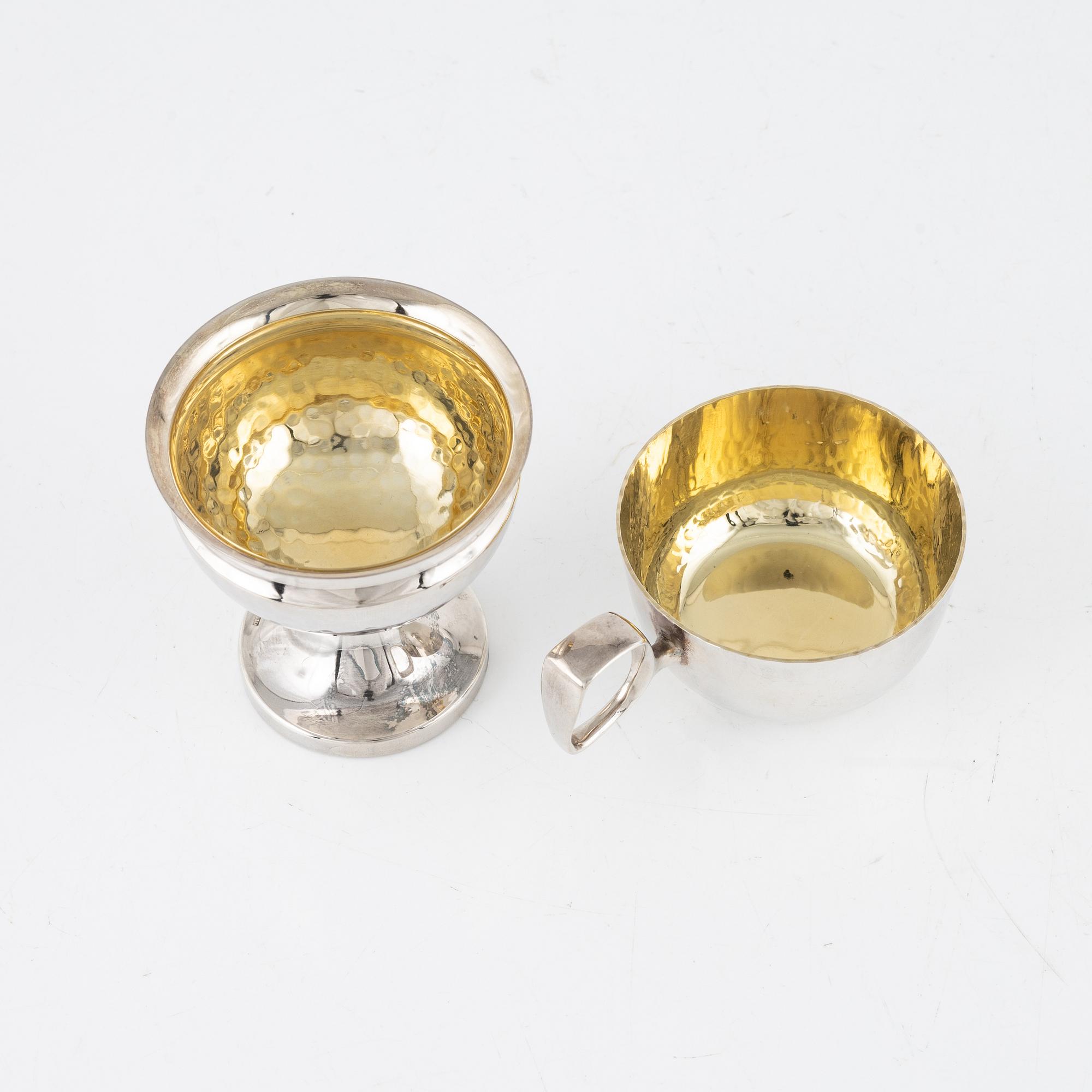 Punschmuggar, 7 st samt bägare, 10 st, silver, bl.a. Eric Löfman, MGAB, Uppsala, 1979.