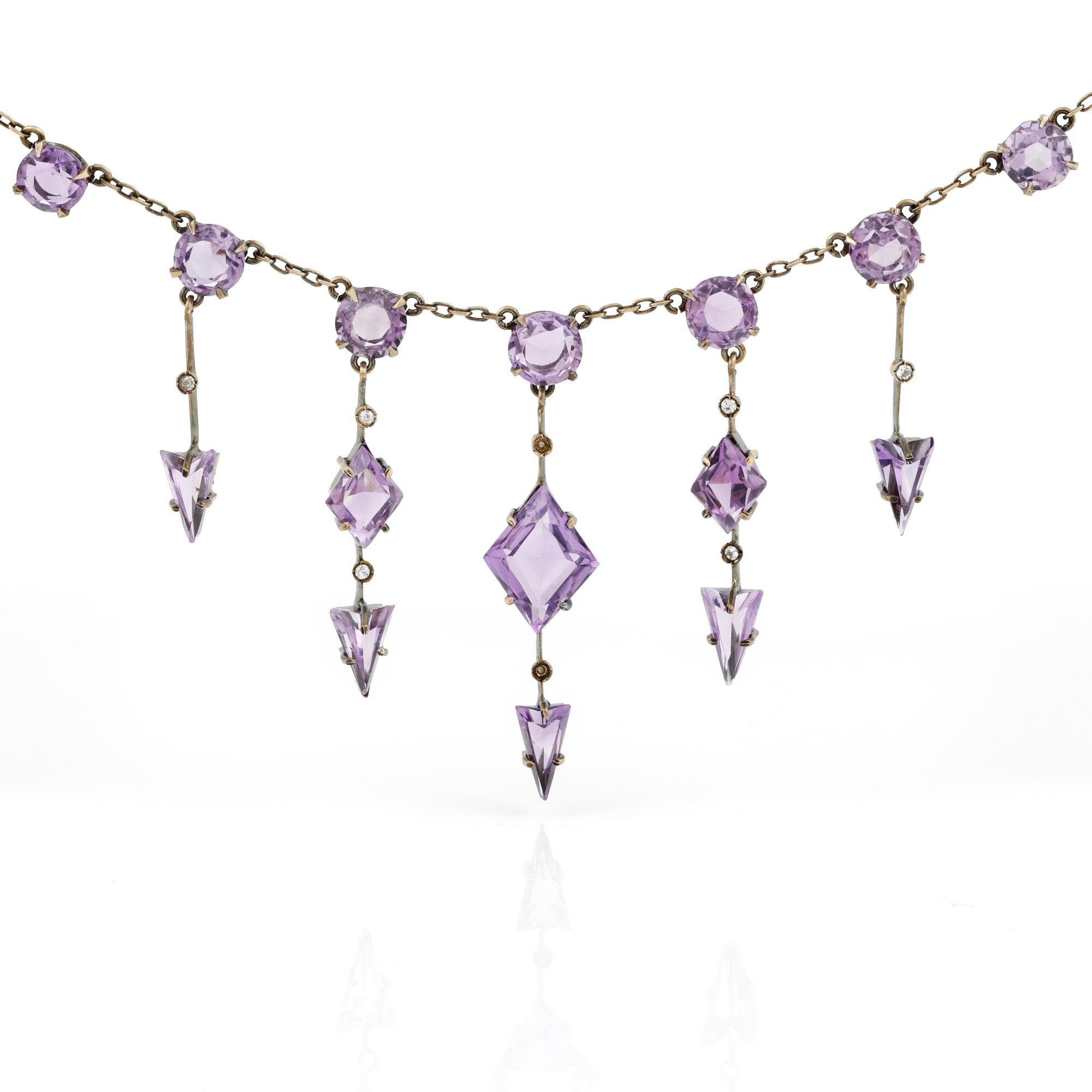 ÖRHÄNGEN samt COLLIER, förgyllt silver 830, halssmycket med ametister.