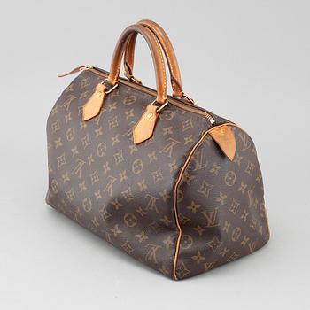 LOUIS VUITTON, a "Speedy 30" bag.