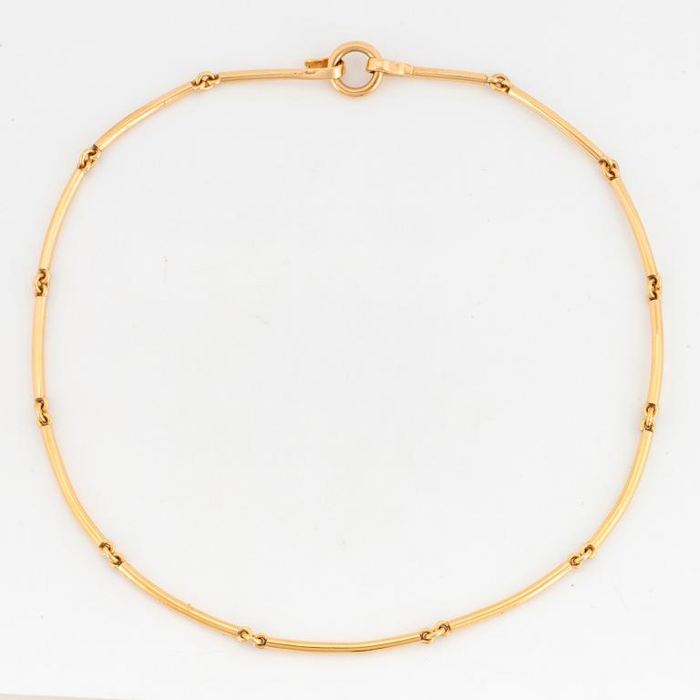 18K gold necklace.