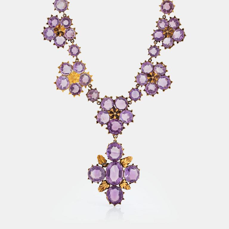 A 14K gold and amethyst necklace.