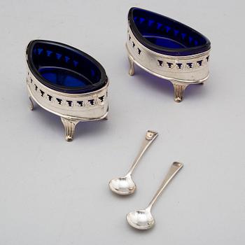 A pair of English 18th century silver and blue glass salts, mark of John Robert probably, London.