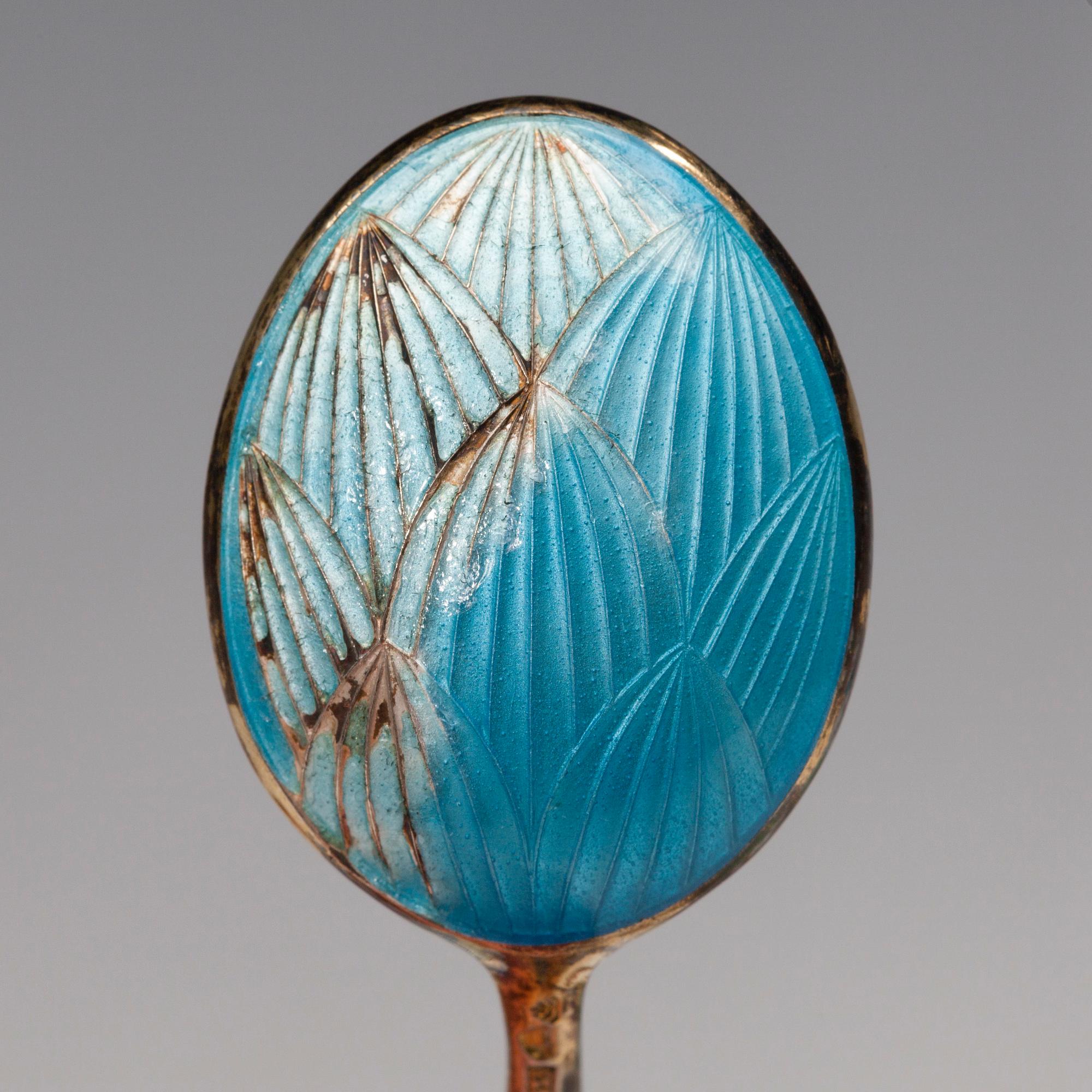 MOCKASKEDAR, 12 st, silver 916 och emalj, Tillander, Helsingfors 1951. Vikt 135 g.