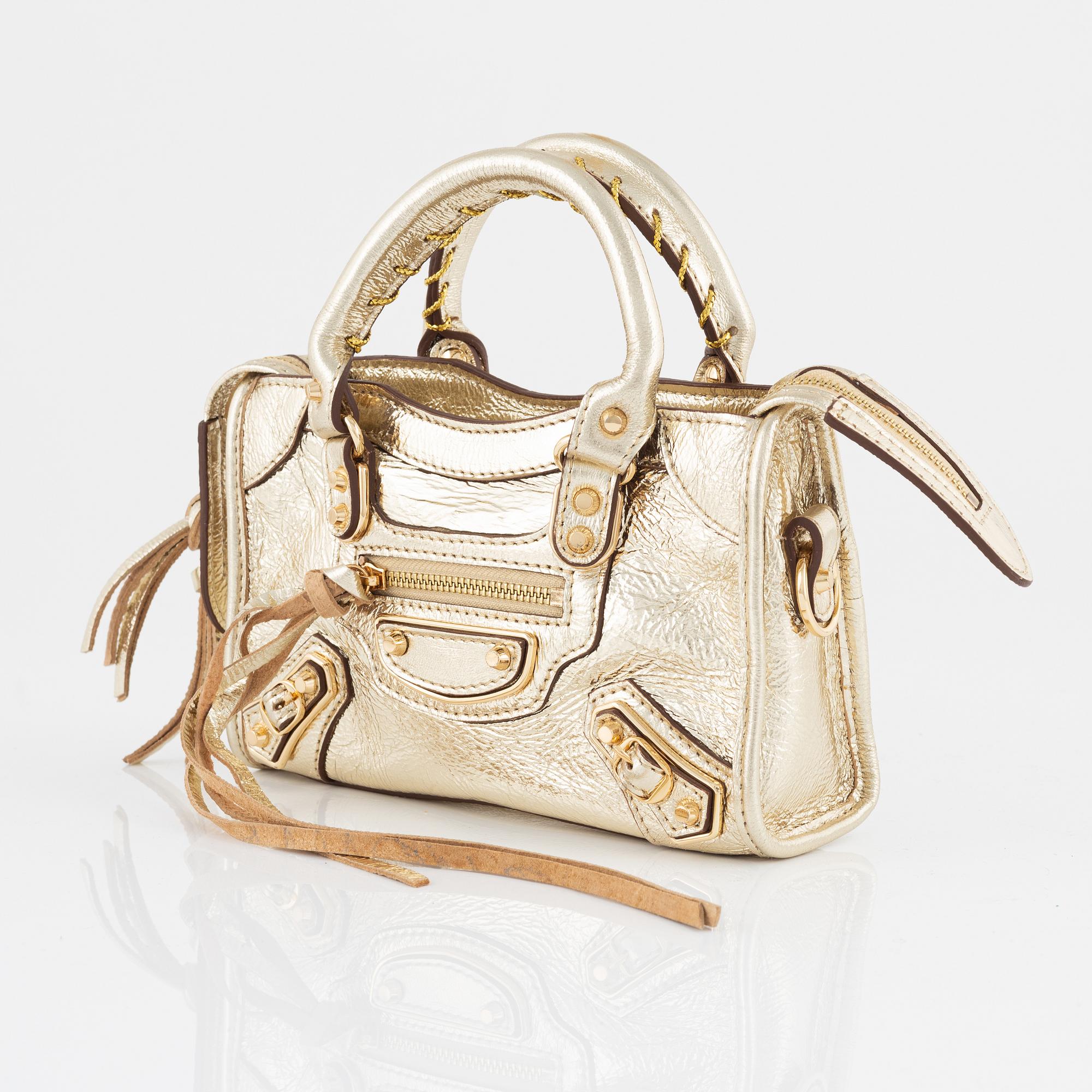 Balenciaga a gold leather Classic City Mini Bag Bukowskis