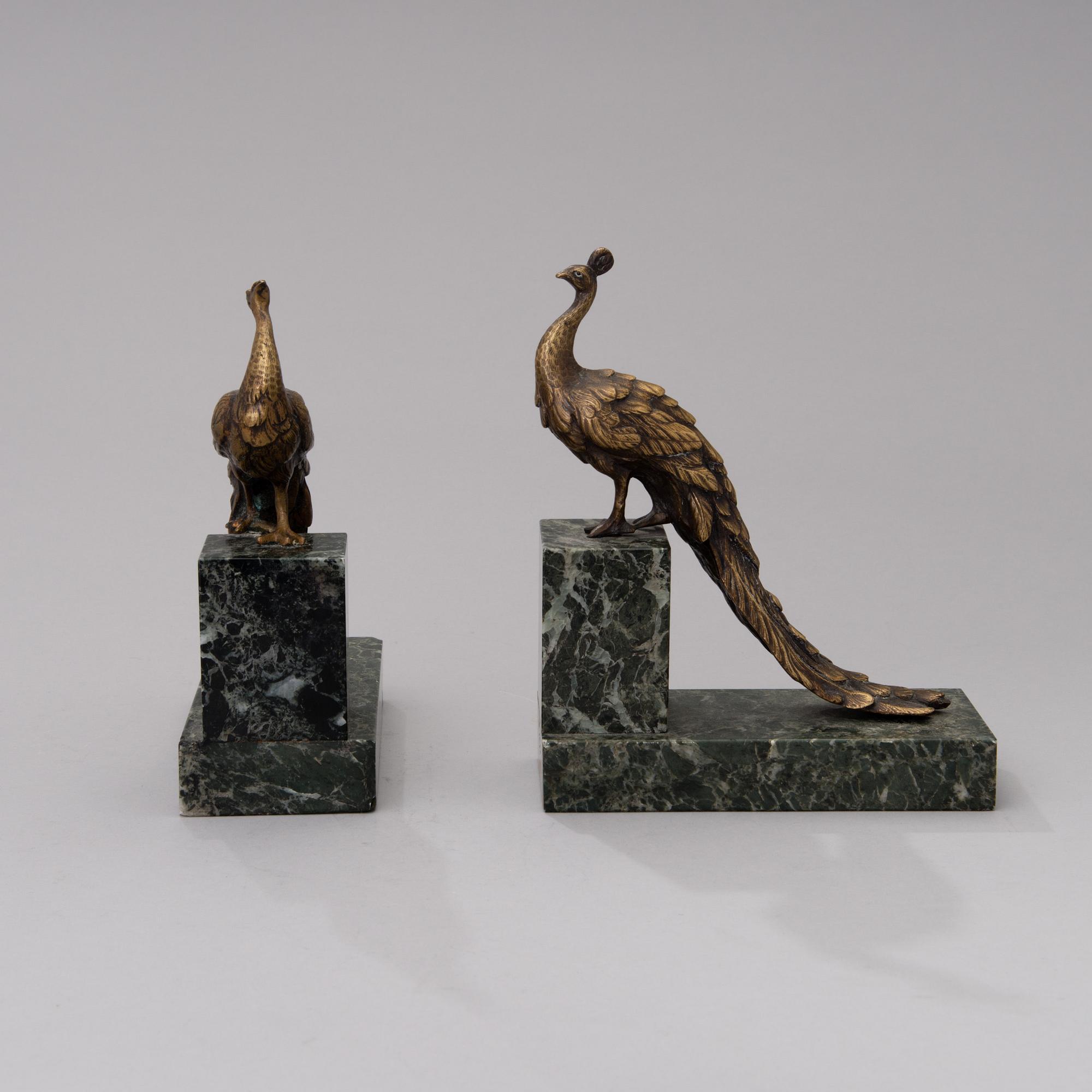 BOKSTÖD, 2 st, mässing och sten, 1900-talets första hälft.