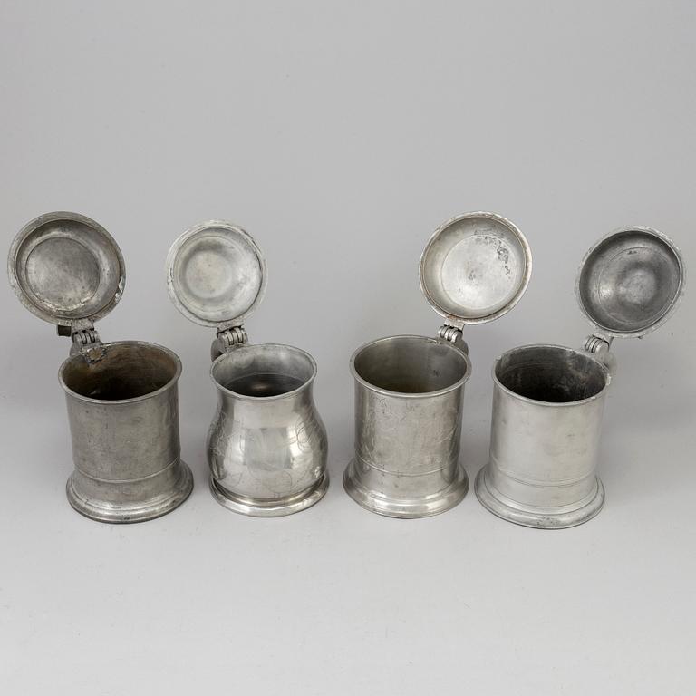 Four Swedish pewter tankards, 19th century.