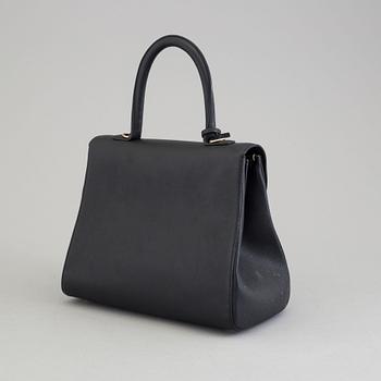A Delvaux "Brillant" ladies handbag in black colored leather.