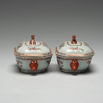 A pair of famille rose 'double peacock' tureens with cover and stands, Qing dynasty, Qianlong (1736-95).