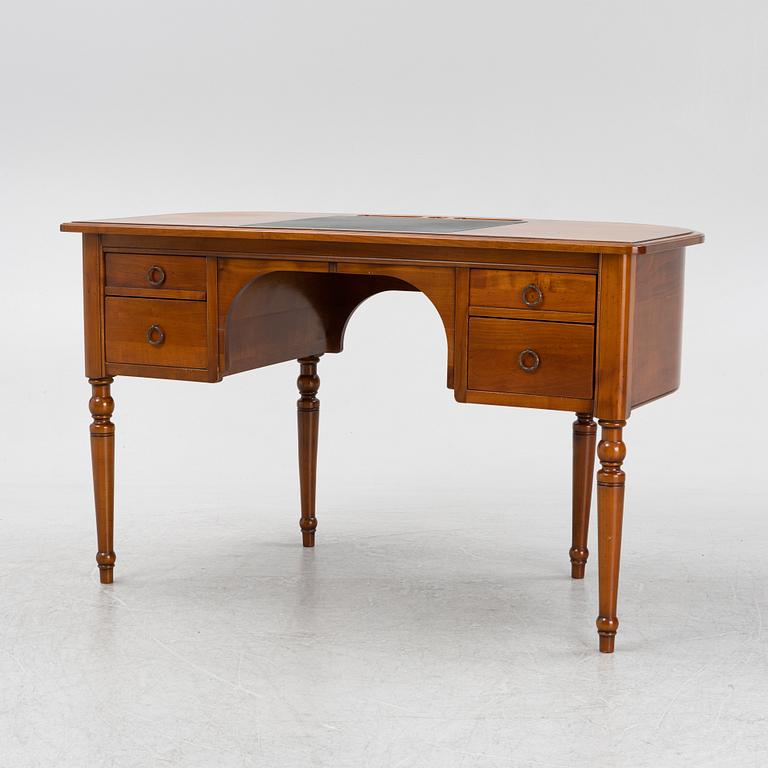 A Cherry wood desk, mid 20th century.