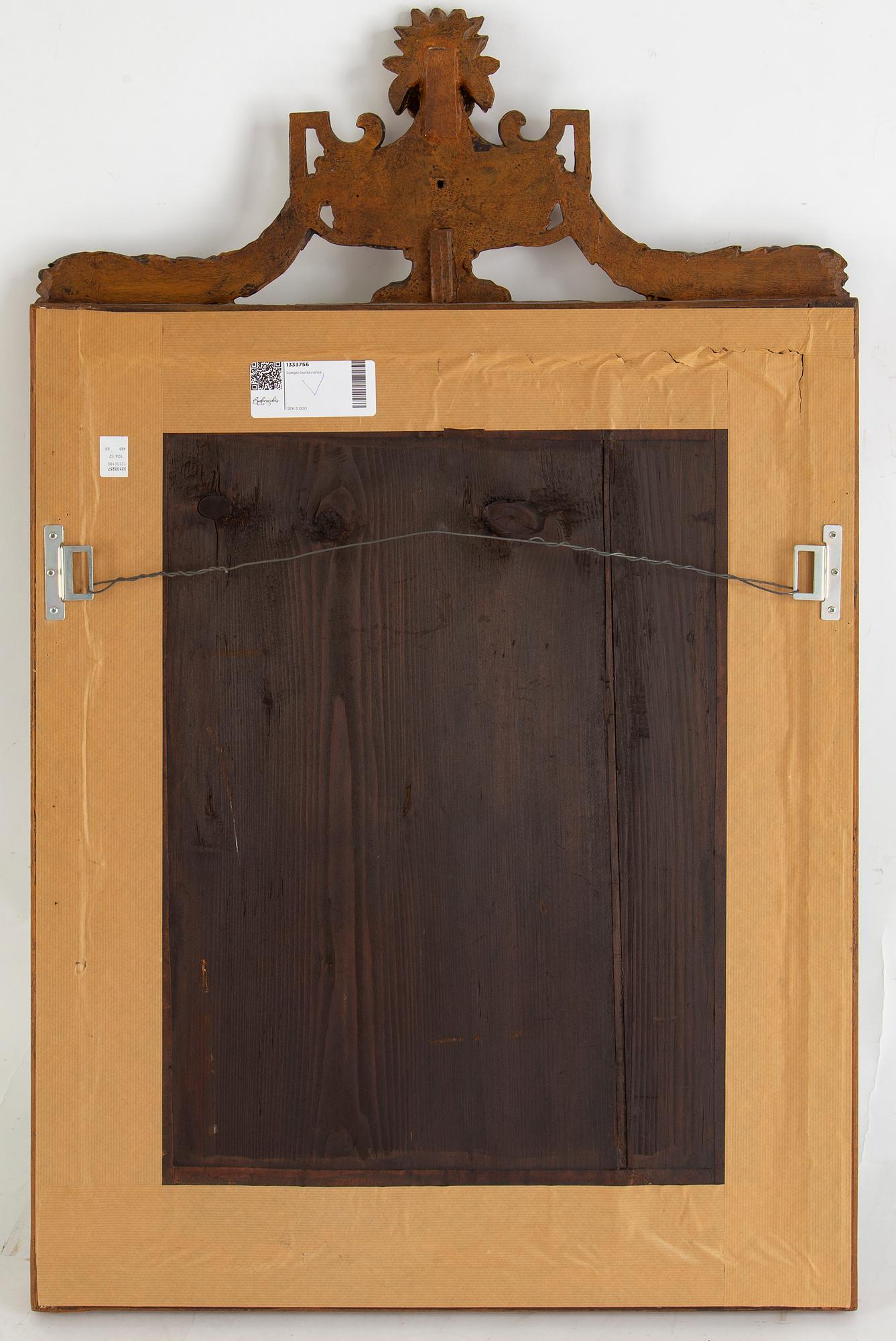 A Gustavian mirror, late 18th century.