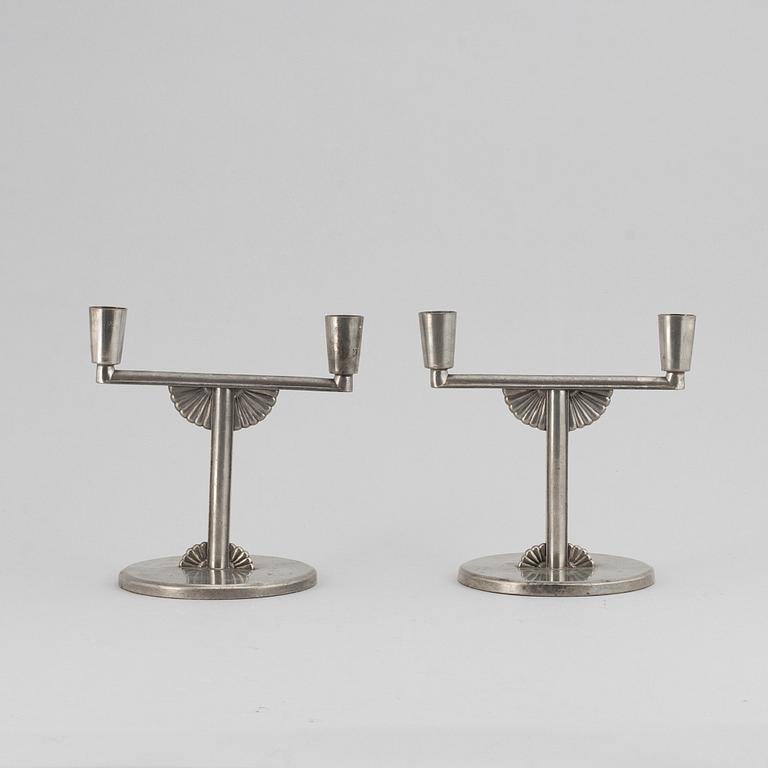 A pair of 1935 pewter candelabras by K E & Co.