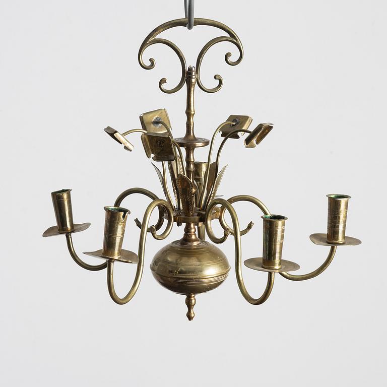 A Swedish five-branch brass chandelier, circa 1800.