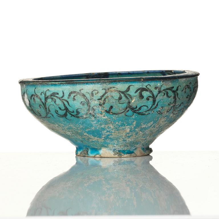 A luster earthenware bowl, Kashan, central Persia, 13th century.