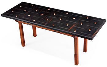 A Hjalmar Jackson ebony and pear wood desk / library table, Stockholm 1934, possibly designed by Oscar Nilsson.