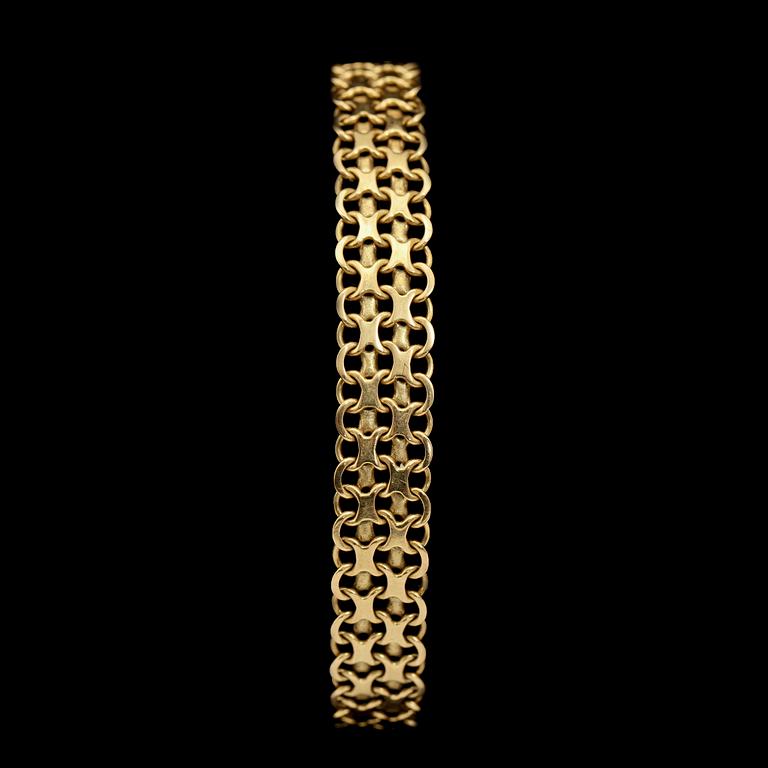 ARMLÄNK, 18 k guld, stmpl SAAB, Stockholm, 1962, vikt 17 g.