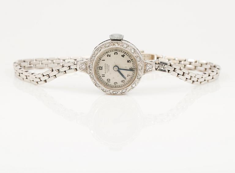 ARMBANDSUR, platina, Bucherer, Lucerne, Swiss, med ARMBAND, 18K vitguld, 1949. Totalvikt med urverk ca 15 gram.