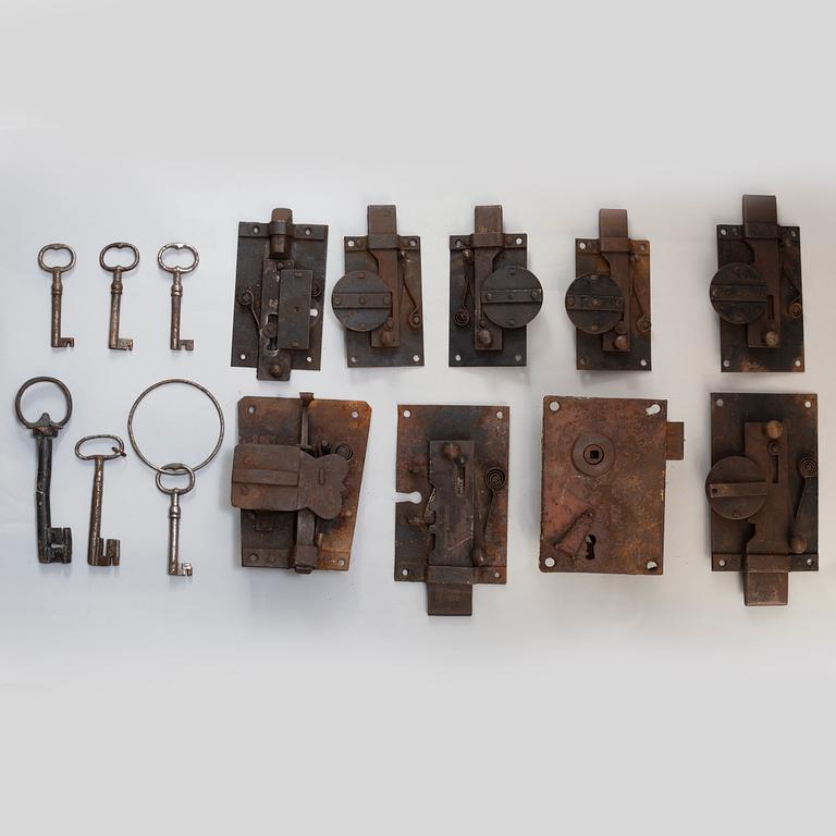 A set of nine cast iron locks, 19th century.