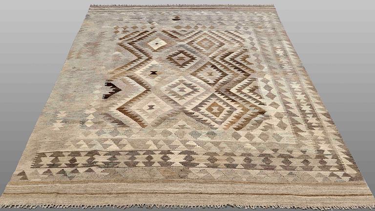 A Kilim carpet, ca 275 x 187 cm.