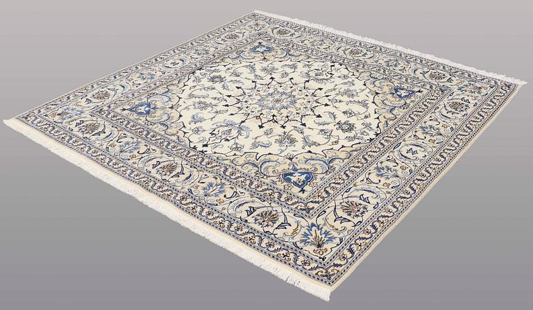 A rug, Nain part silk, ca 197 x 197 cm.