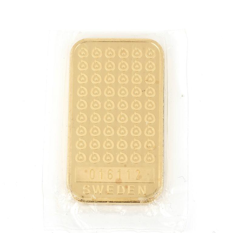 GULDTACKA, 24K guld, Boliden. Vikt 100g.