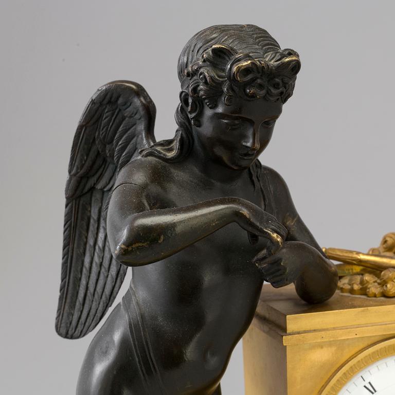 A French empire early 19th century mantel clock.