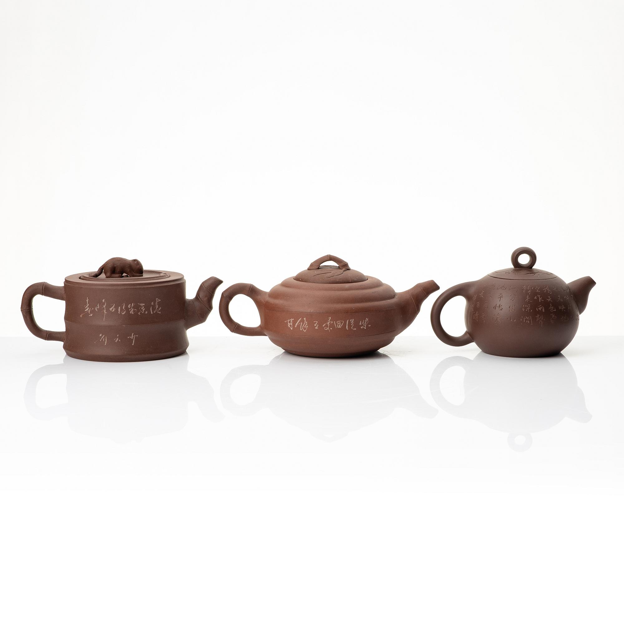 A group of three Chinese yixing teapots, 1960-80s.