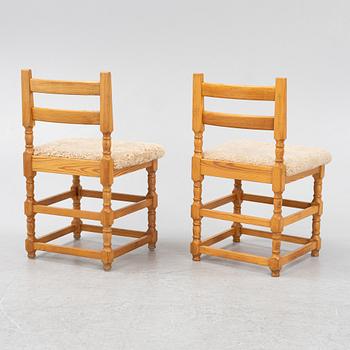 A set of eight pine chairs with new sheepskin upholstery, 1970s.